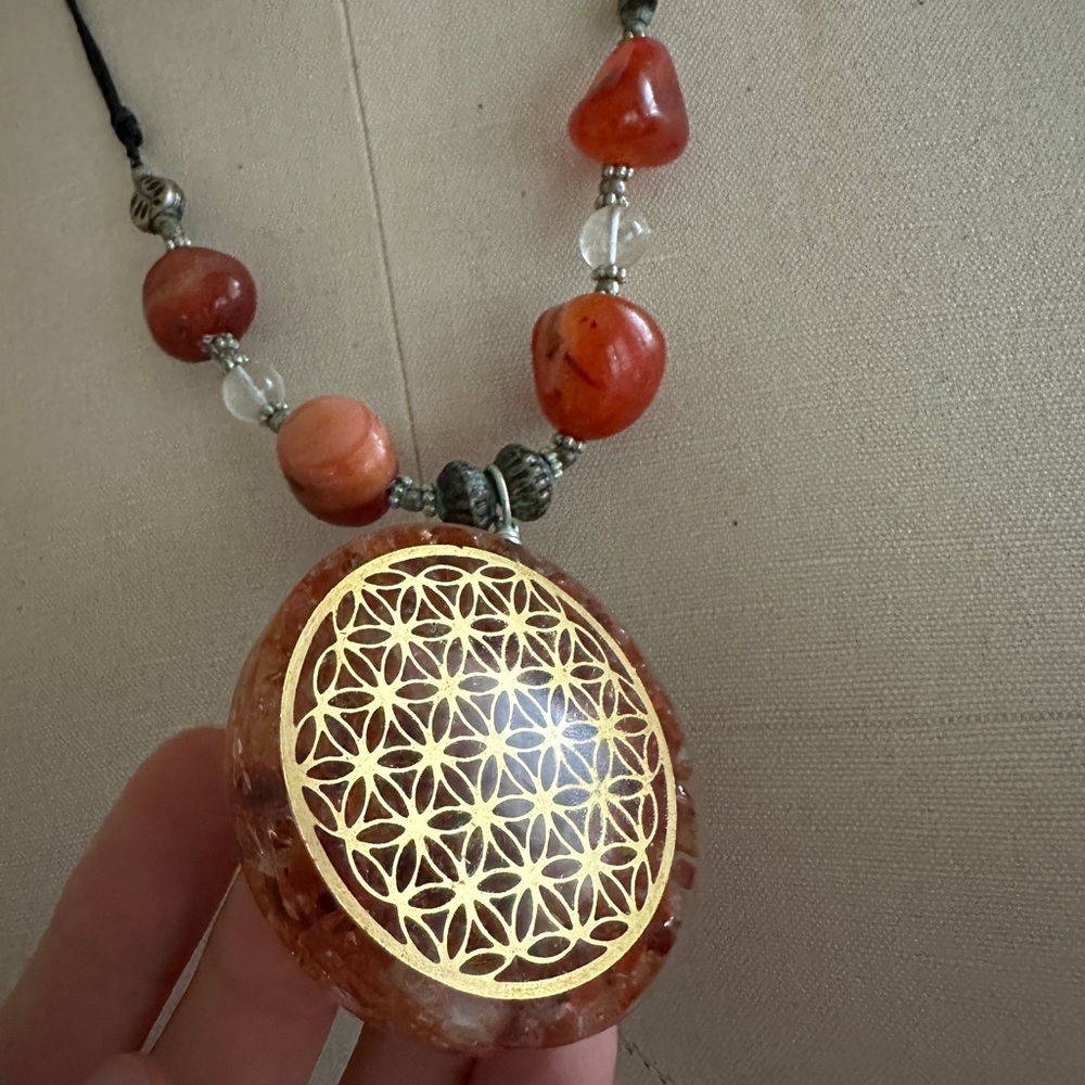 Flower of life resin and gemstone  necklace.